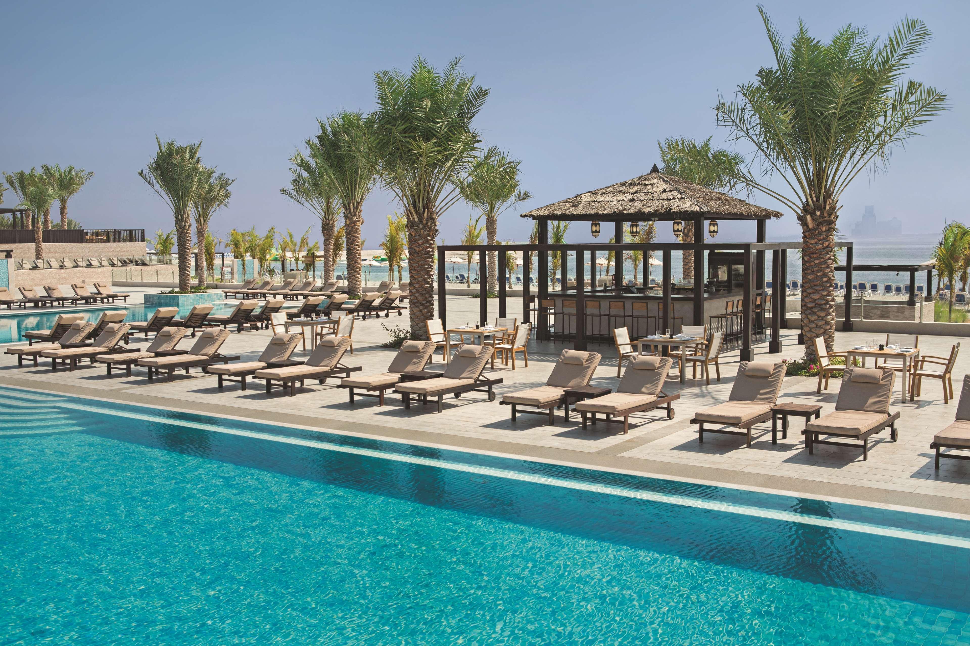 Doubletree By Hilton Resort & Spa Marjan Island Ras al-Khaimah Exterior foto The pool at the resort